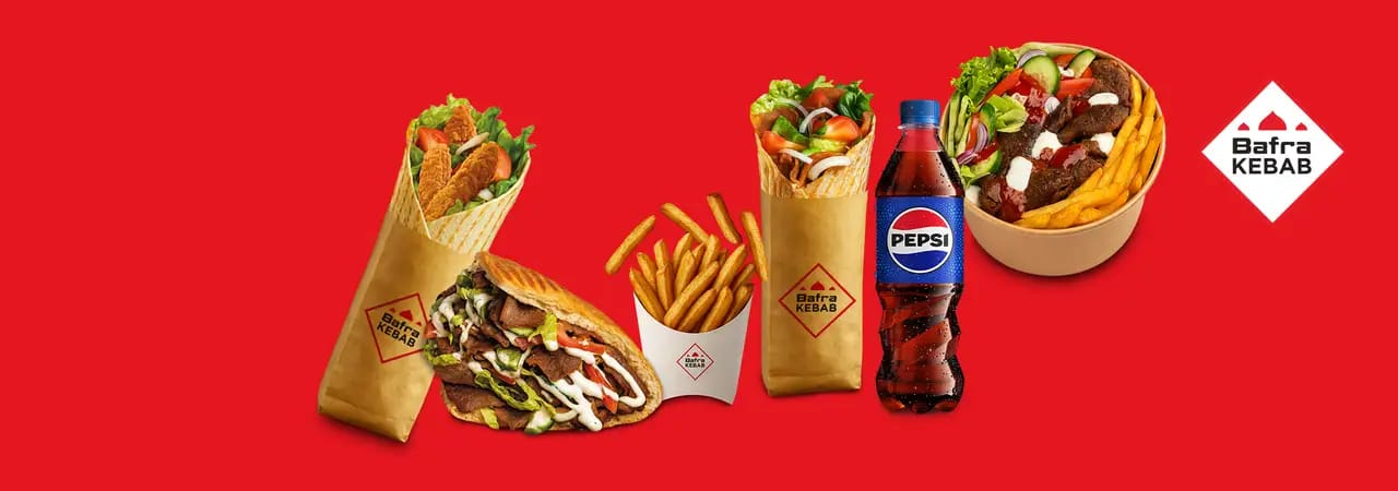 Bafra Kebab — rollo, talerz, frytki i napoje